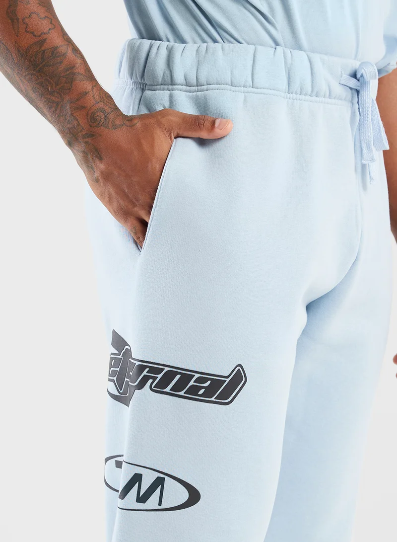 The Giving Movement Relaxed Fitted Racing Printed Sweatpants