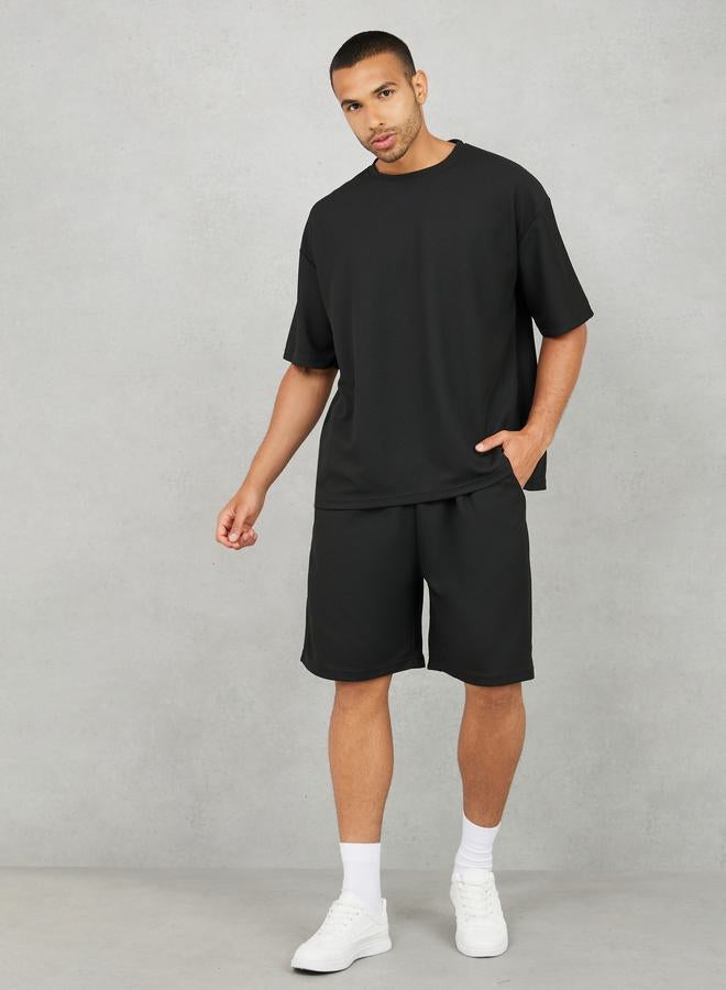Styli Solid Textured Knit Oversized Streetwear T-Shirt & Shorts Set  - Image 1