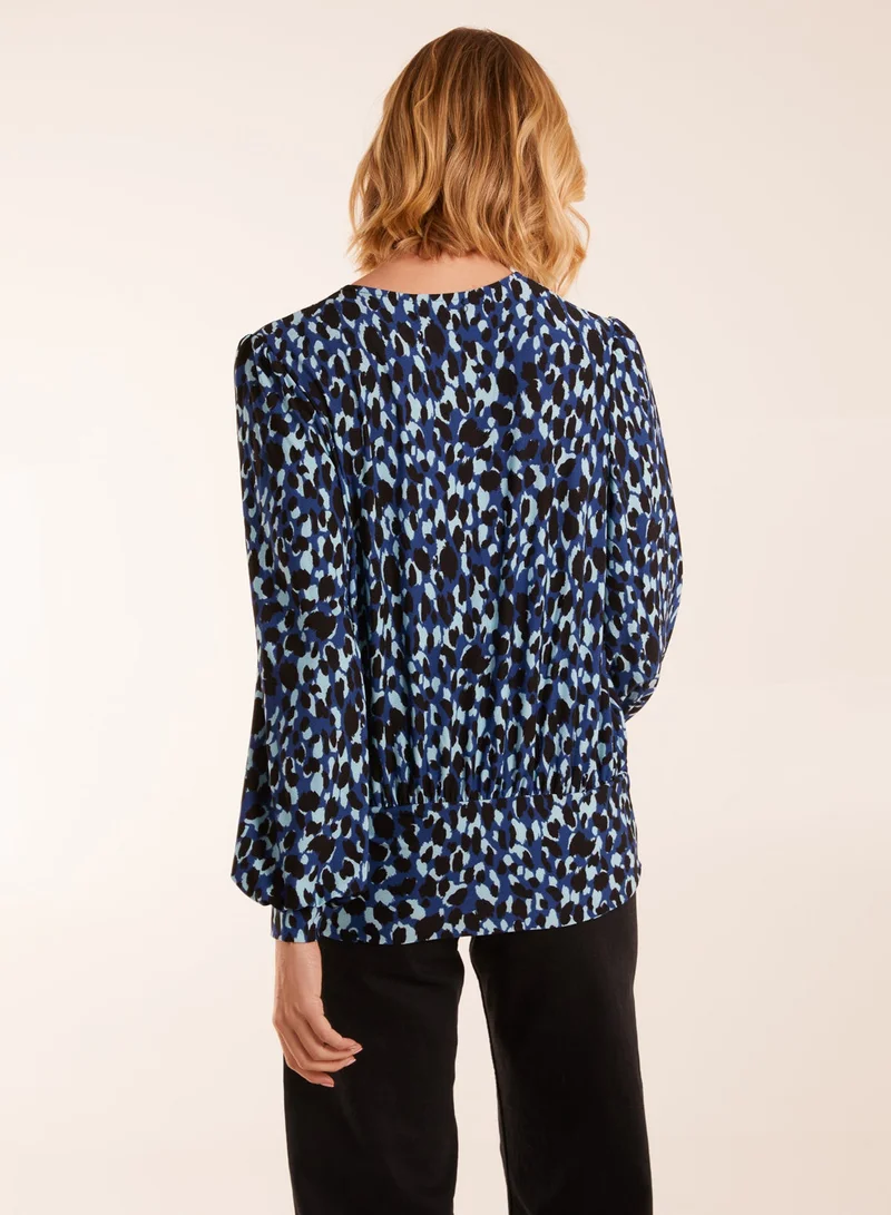 Blue Vanilla Wrap Front Leopard Print Deep Hem Band Top