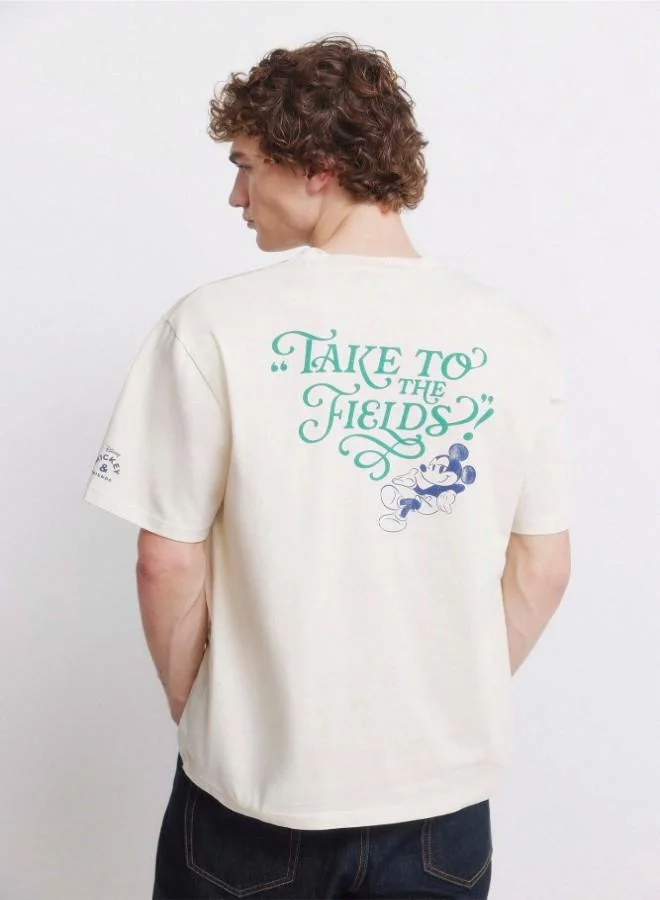 Springfield  Cotton loose fit ribbed round neck with Mickey prints on the chest and back short-sleeved T-shirt for Men | Best Price UAE