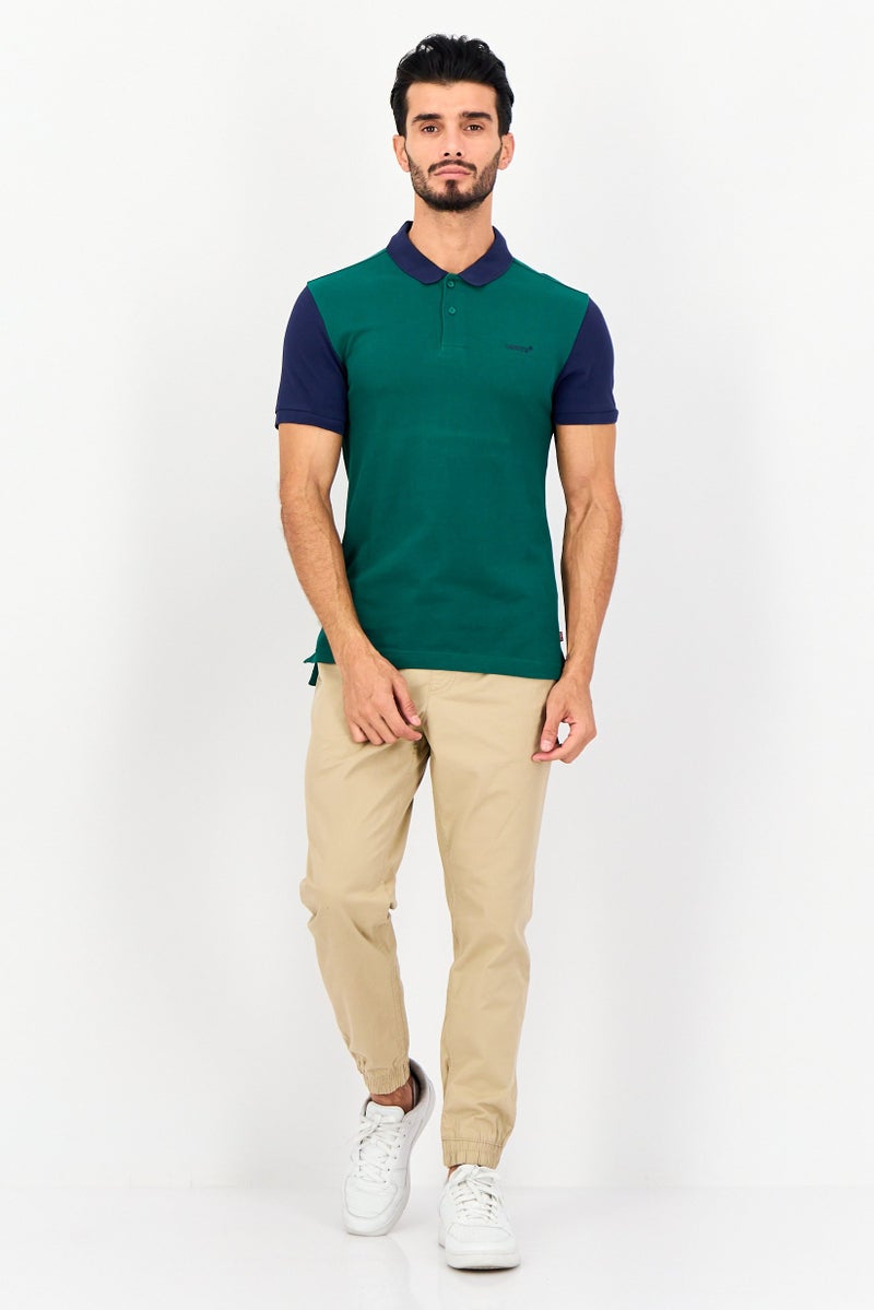 Levi's قميص بولو بأكمام قصيرة للرجال مع ياقة منتشرة وشعار العلامة التجارية، أخضر - Image 4