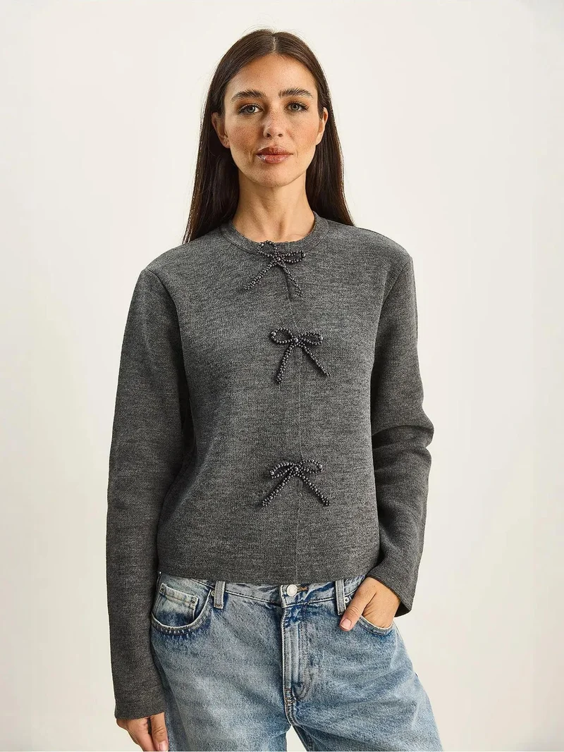 بيانكو لوتشي كارديجان محبوك بياقة دائرية وتفاصيل فيونكة