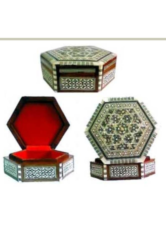 Add elegance and timeless craftsmanship to your collection with this handcrafted hexagonal mother-of-pearl inlay box. Beautifully crafted from quality wood and decorated with intricate traditional geometric patterns, this exquisite piece reflects authentic artisanal heritage and attention to detail.  The interior is lined with soft red fabric, providing a luxurious and protective space for jewelry, accessories, keepsakes, and treasured collectibles. Its distinctive hexagonal shape and decorative inlay work make it both a practical storage solution and an eye-catching decorative accent.  Perfect for storing rings, bracelets, necklaces, and small valuables, this handcrafted box also makes a thoughtful gift for lovers of traditional craftsmanship, fine décor, and unique handmade pieces.