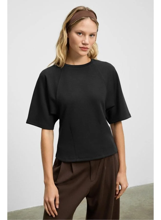 Grimelange JOLIEZA Women's Crew Neck Detailed Short Raglan Sleeve Relaxed Fit Black Blouse.