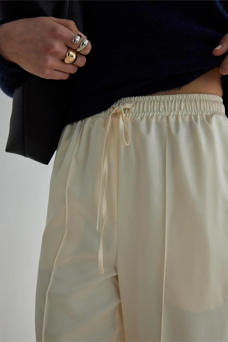سود كوليكشن Saud Collection Cream Ross Satin Trousers