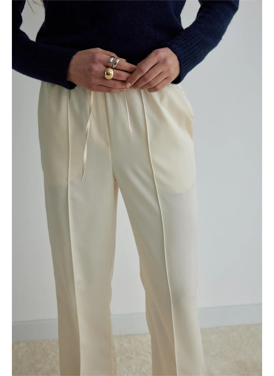 سود كوليكشن Saud Collection Cream Ross Satin Trousers