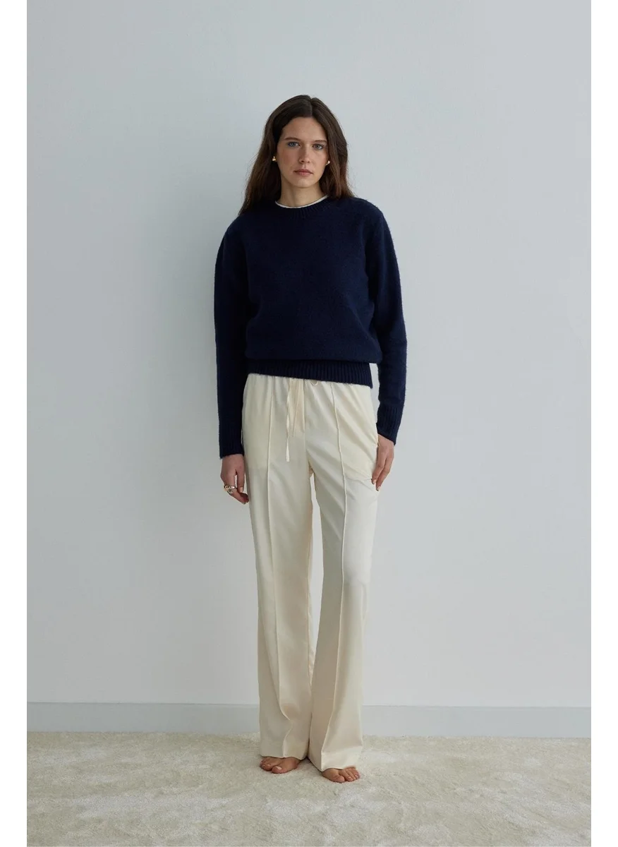 سود كوليكشن Saud Collection Cream Ross Satin Trousers
