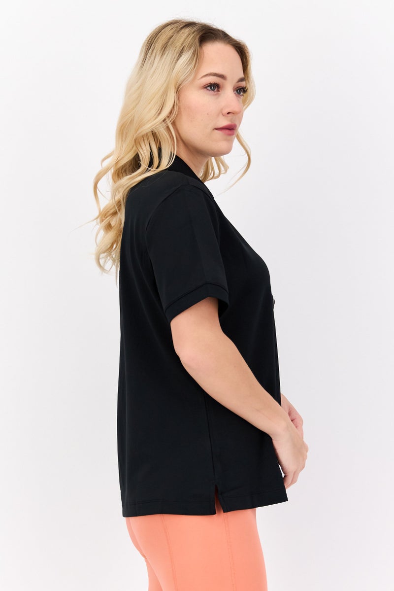 Greg Norman تي شيرت بولو تدريب قصير الأكمام للنساء، أسود - Image 3