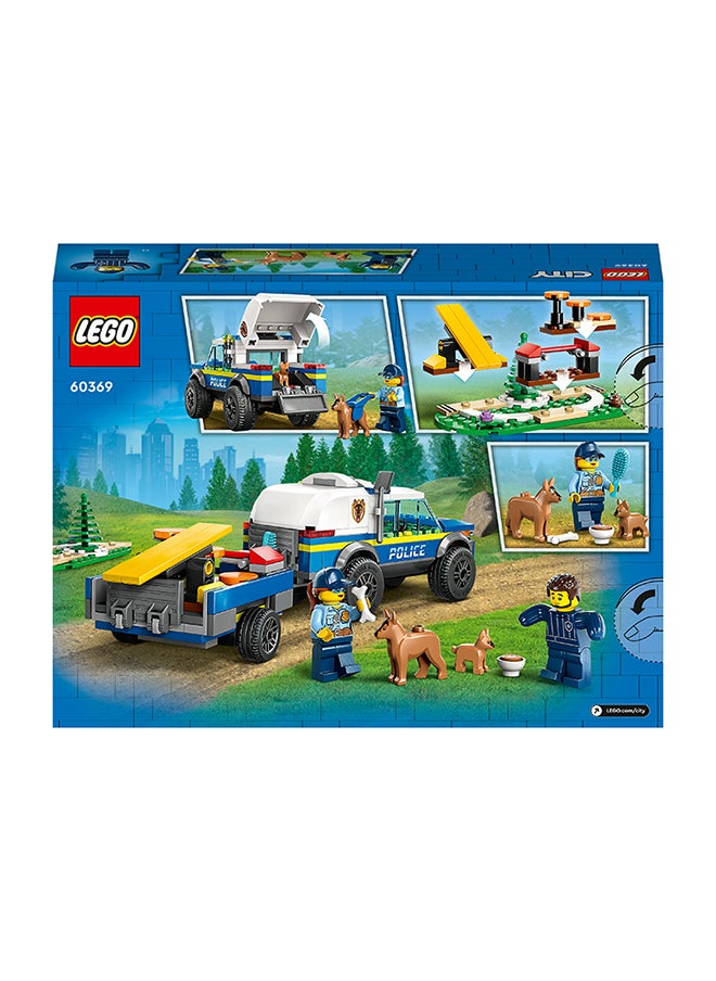 LEGO - مجموعة ألعاب بناء تدريب كلب الشرطة المتنقل في المدينة 60369 للأطفال من عمر 5 سنوات فأكثر؛ تشمل سيارة دفع رباعي، مقطورة، أرجوحة، قضيب قفز، خطوات أقدام، شخصيتين صغيرتين و2 شخصيات كلب، بما في ذلك جرو (197 قطعة) - Image 1