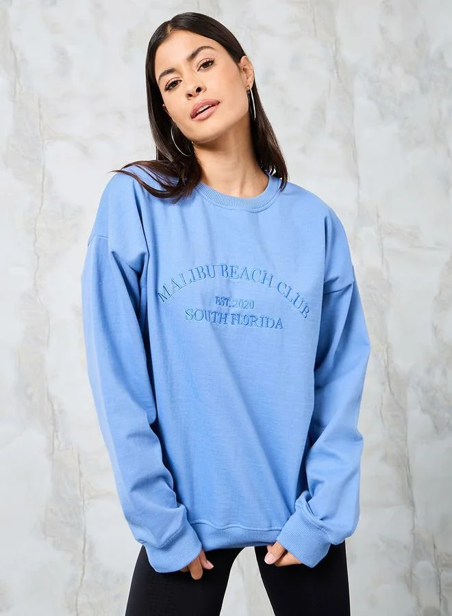 ستايلي Oversized Embroidered Slogan Cotton Sweatshirt