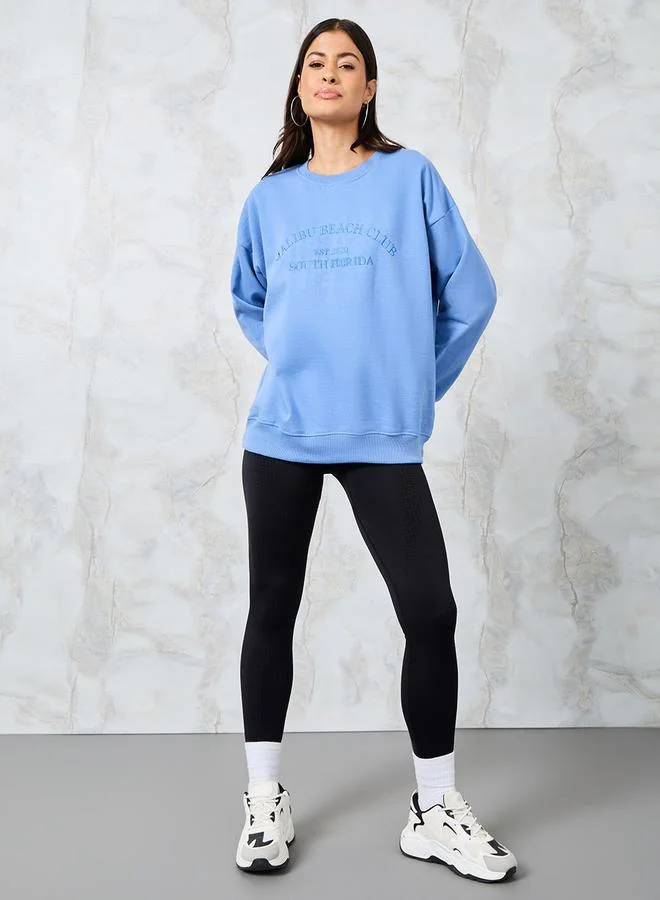 ستايلي Oversized Embroidered Slogan Cotton Sweatshirt