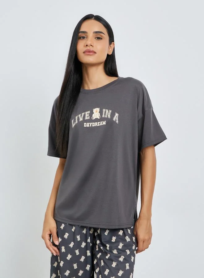 Styli Teddy Slogan Drop Shoulder Side Split T-Shirt and Pyjama Set