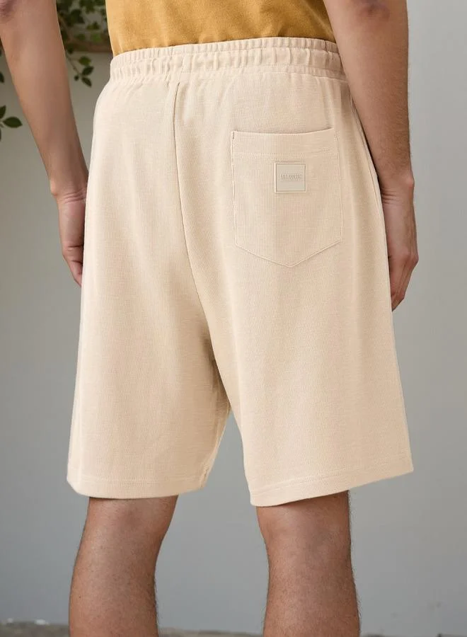 Lee Cooper  Lee Cooper Logo Applique Shorts with Drawstring Closure for Men | Best Price UAE