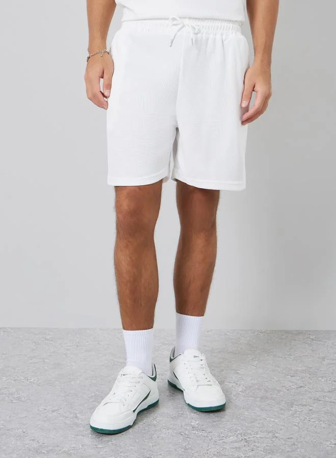 Styli  Men White Oversized Solid Polo and Shorts Co-Ords for Men | Best Price UAE