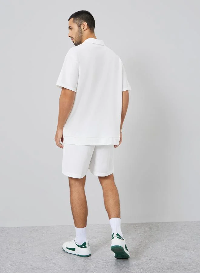 Styli  Men White Oversized Solid Polo and Shorts Co-Ords for Men | Best Price UAE