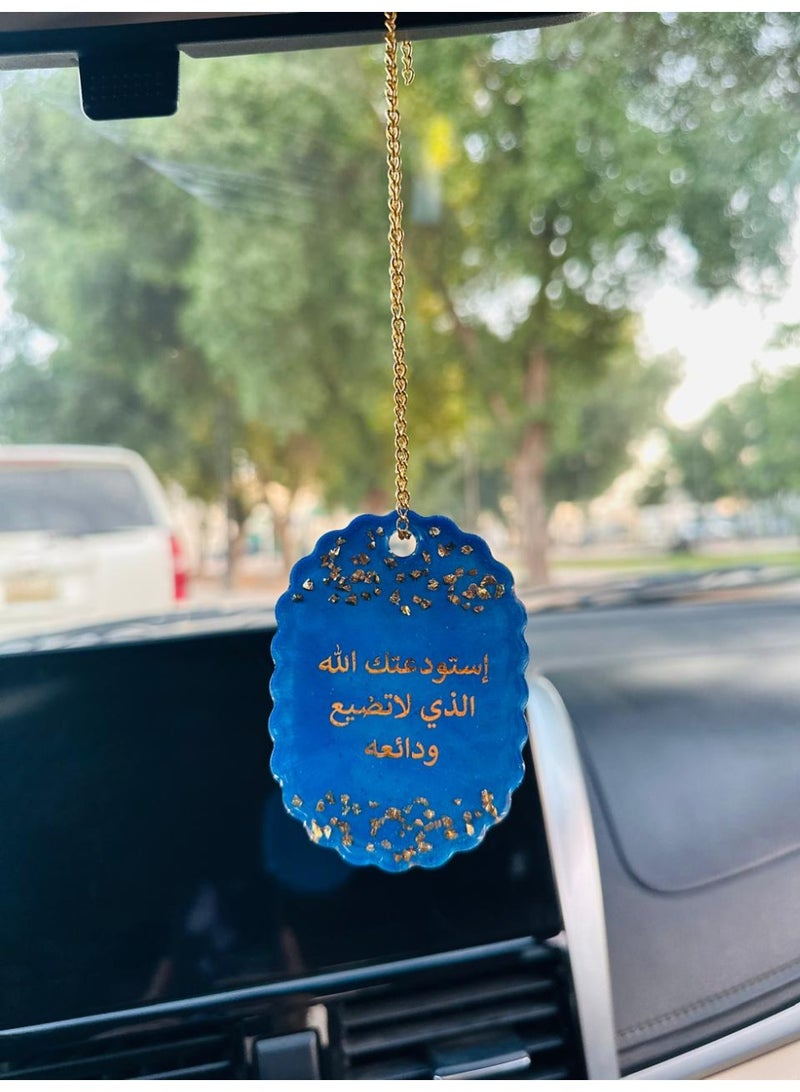 A car ornament decorated with gold leaf and an Islamic phrase on one side; a car decoration accessory. - Image 4