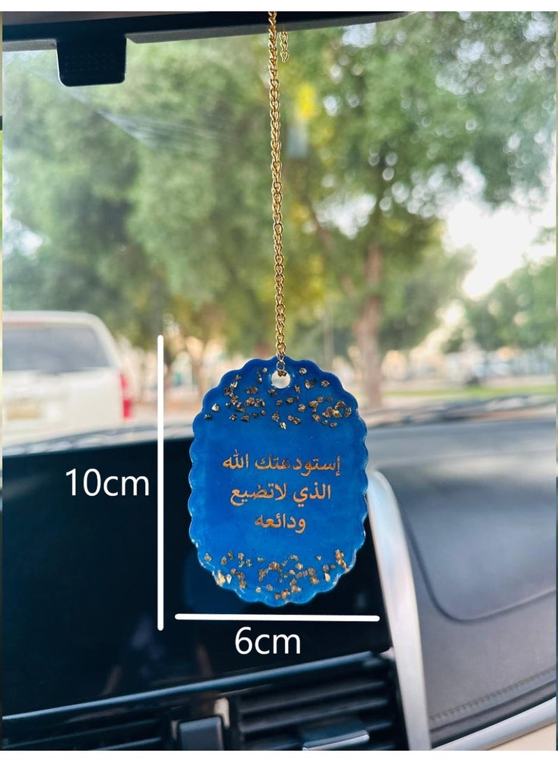A car ornament decorated with gold leaf and an Islamic phrase on one side; a car decoration accessory. - Image 2