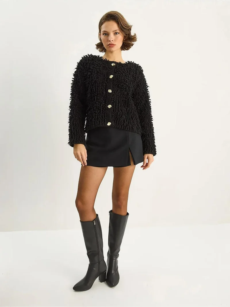 بيانكو لوتشي كارديجان بأزرار مزخرف من لوكسي