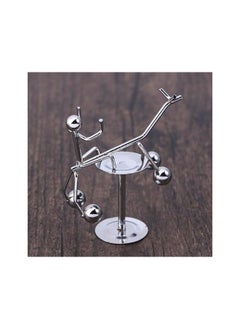 "Enjoy an experience of balance and calm with the Newton's Cradle - elegant design, smooth movement, and a clever decorative touch that adds a sophisticated scientific touch to your office or home. "