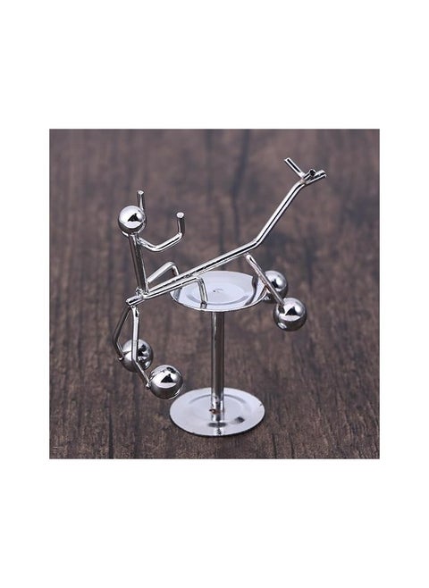 "Enjoy an experience of balance and calm with the Newton's Cradle - elegant design, smooth movement, and a clever decorative touch that adds a sophisticated scientific touch to your office or home. "