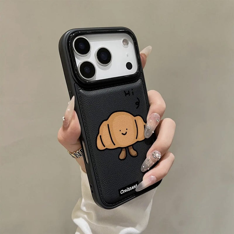 جراب هاتف Apple iPhone 17 Pro Max، مزود بتصميم فريد على شكل وجه مبتسم على شكل كرواسون، جراب جلدي أسود مبتكر مقاوم للصدمات بتصميم كرتوني