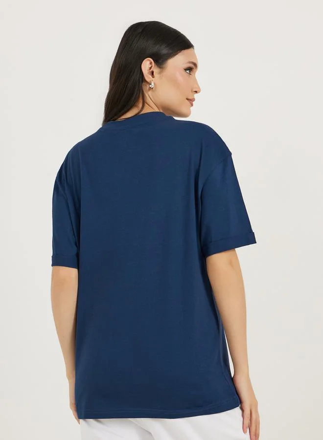 Styli Styli Graphic Print Rolled Up Short Sleeve T-Shirt