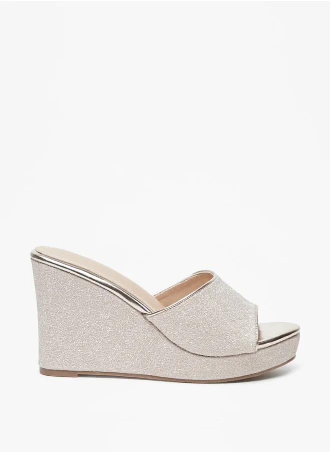 فلورا بيلا Women's Textured Slip-On Sandals with Wedge Heels