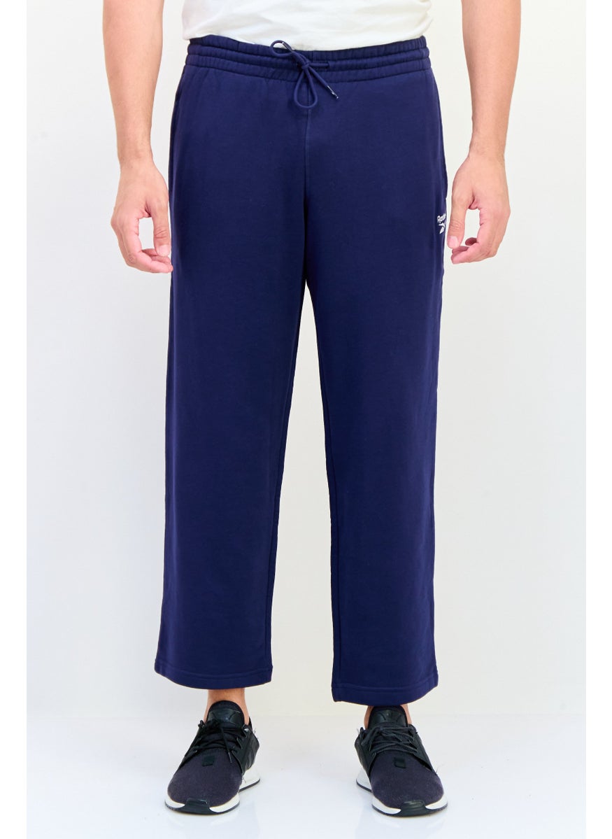 Reebok Men Sportswear Fit Embroidered Logo Outdoor Sweatpants, Navy  - Image 1