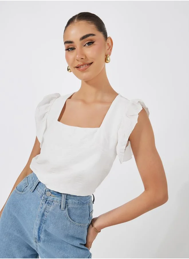 ستايلي Square Neck Woven Top with Flutter Sleeves