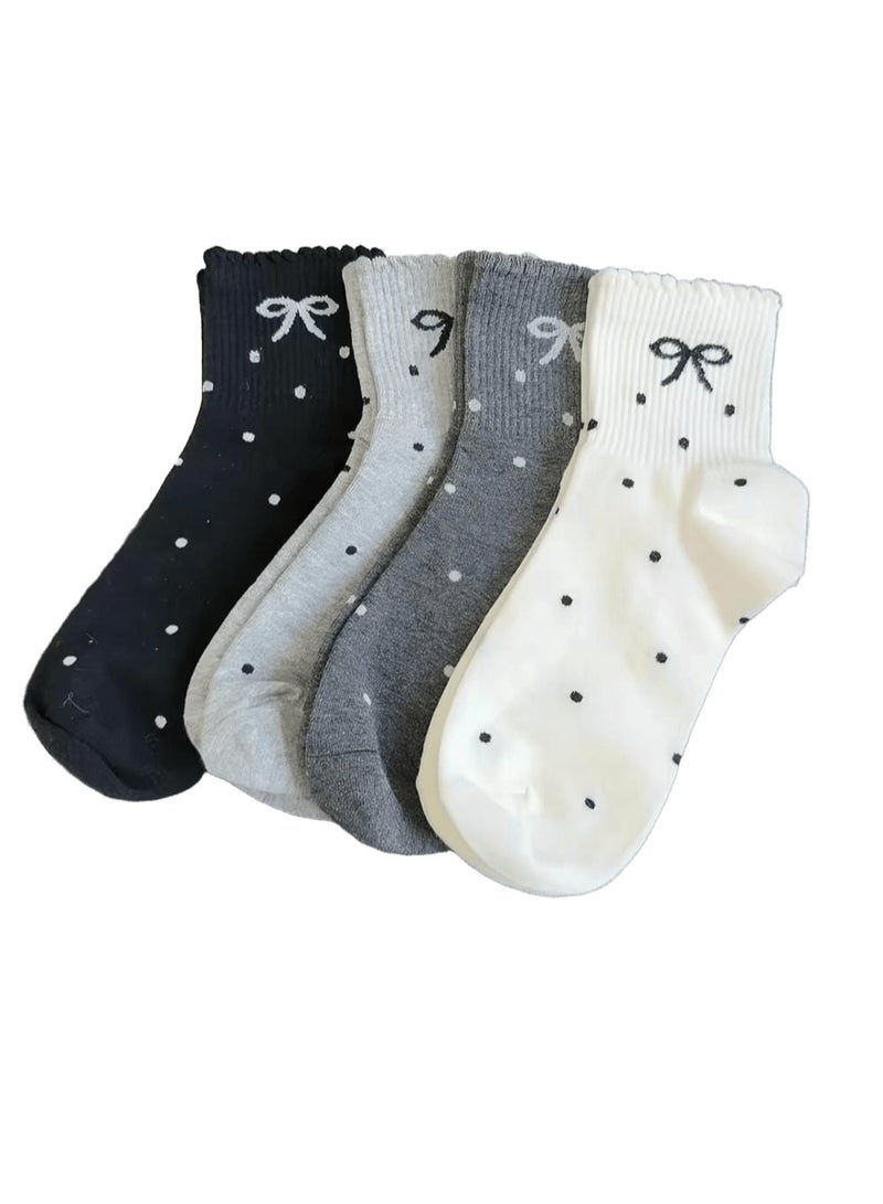 SMARTEDGE women's socks featuring polka-dot and bow patterns for a lovely look. This set includes six pairs of assorted socks, all boasting a modern design. - Image 1