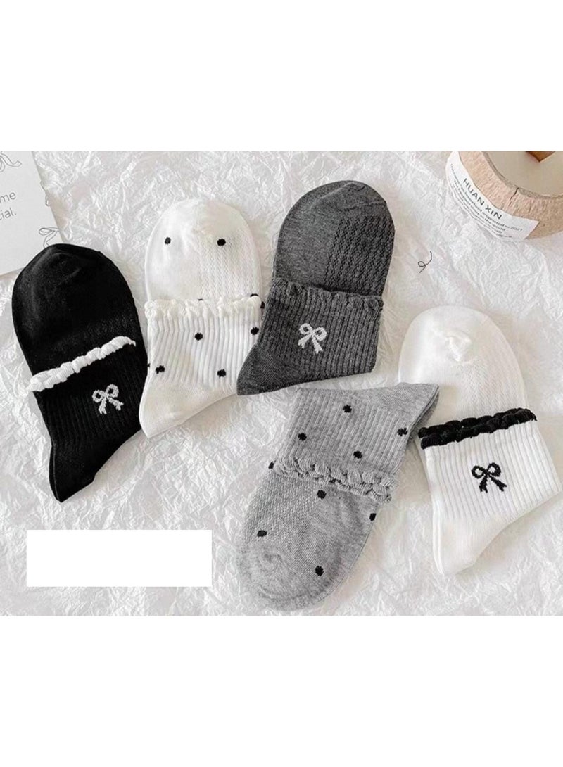 SMARTEDGE women's socks featuring polka-dot and bow patterns for a lovely look. This set includes six pairs of assorted socks, all boasting a modern design. - Image 2