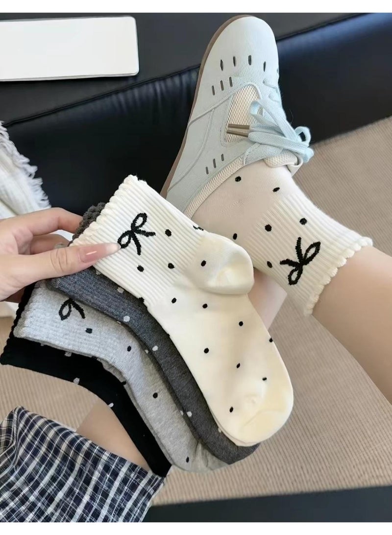 SMARTEDGE women's socks featuring polka-dot and bow patterns for a lovely look. This set includes six pairs of assorted socks, all boasting a modern design. - Image 5