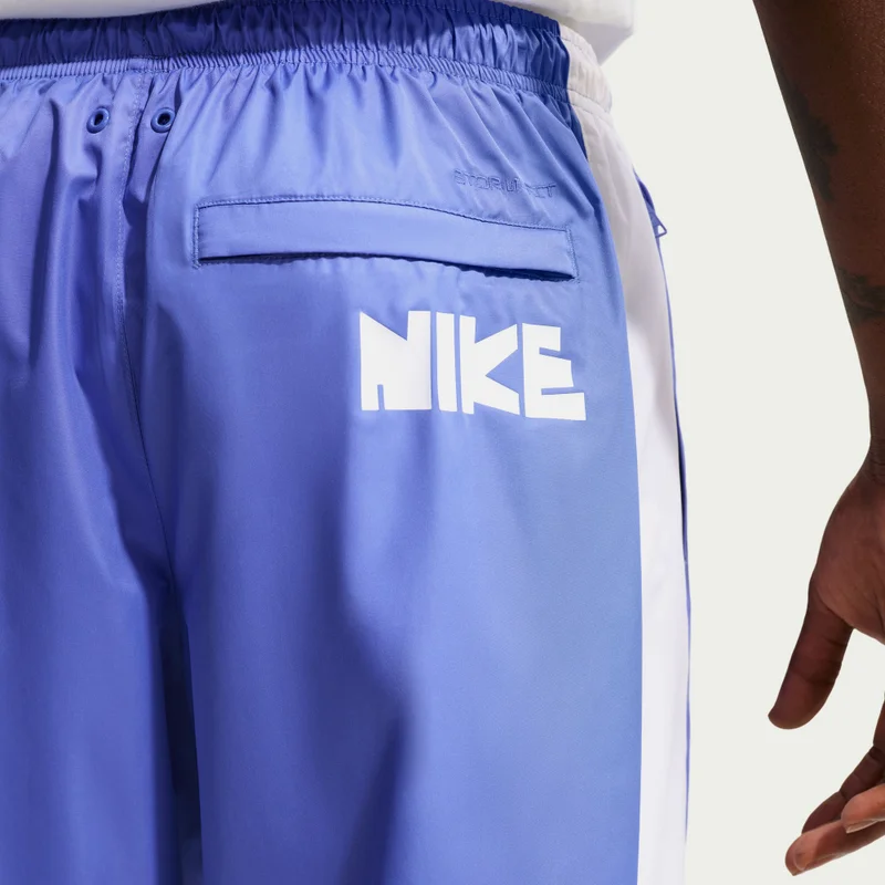 Nike Purple Men's Windrunner Woven Graphic Pants for Men | Best Price UAE