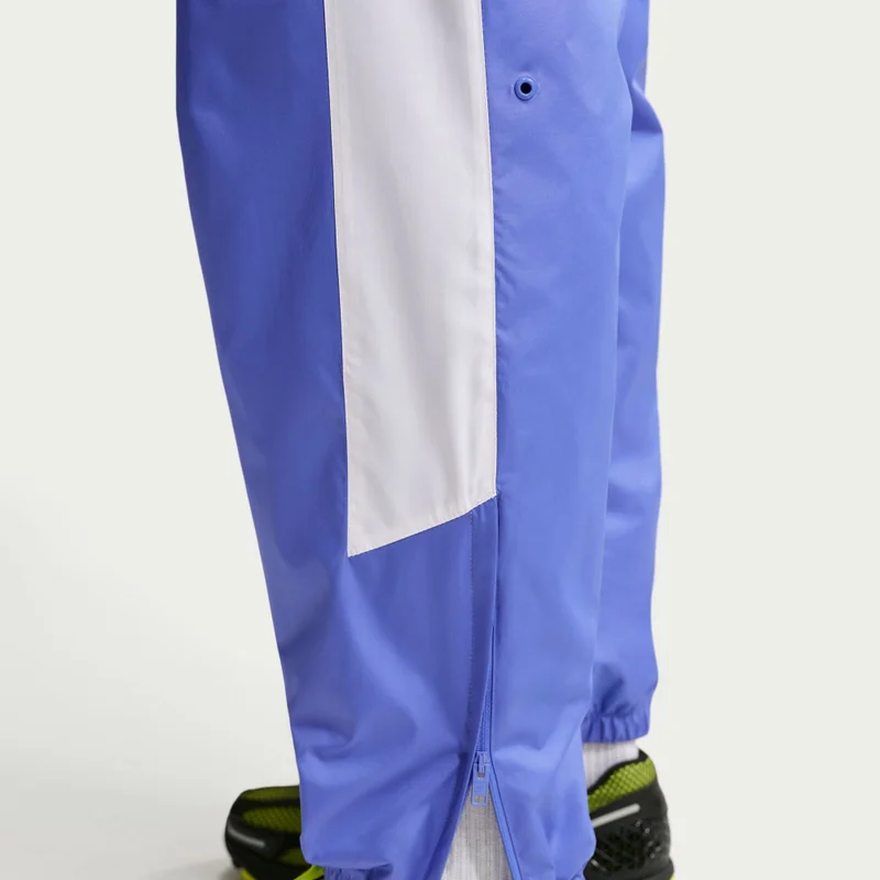Nike Purple Men's Windrunner Woven Graphic Pants for Men | Best Price UAE