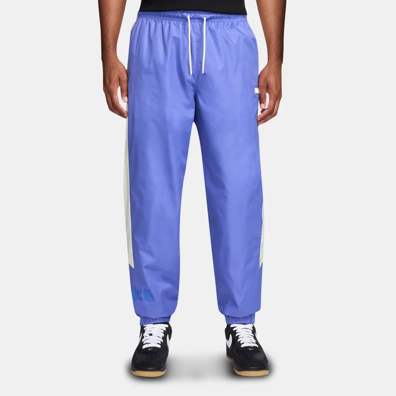 Nike Purple Men's Windrunner Woven Graphic Pants for Men | Best Price UAE