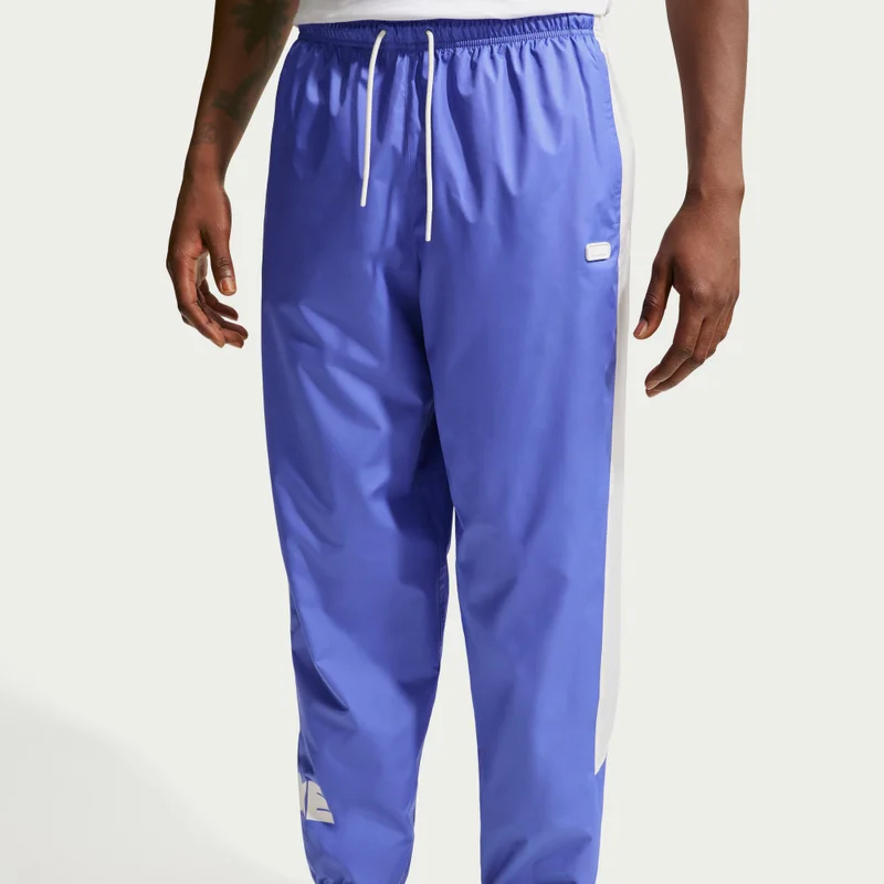 Nike Purple Men's Windrunner Woven Graphic Pants for Men | Best Price UAE