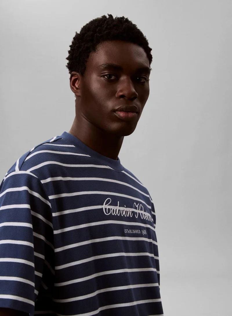 Calvin Klein Jeans Dark Denim Relaxed Cotton Piqué Stripe T-Shirt for Men | Best Price UAE
