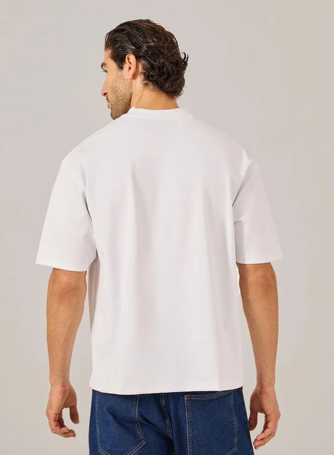 Styli Embroidered Pocket Oversized T-Shirt