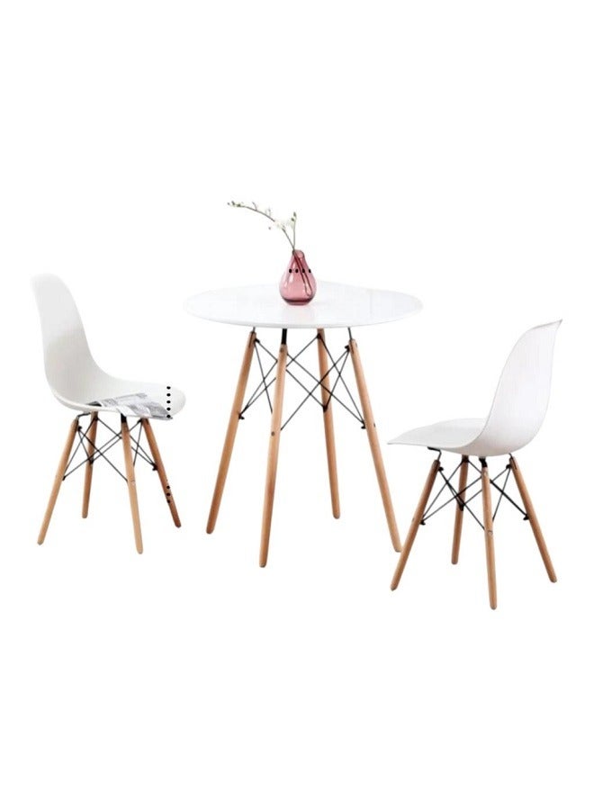Generic Modern design table and chairs set for home and apartment, consisting of two chairs, plastic seats, wooden legs and a metal frame 