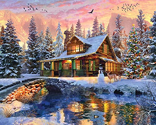 Springbok Rocky Mountain Christmas 1000 Piece Jigsaw Puzzle Cabin in The Woods nestled in The Mountains - Image 1