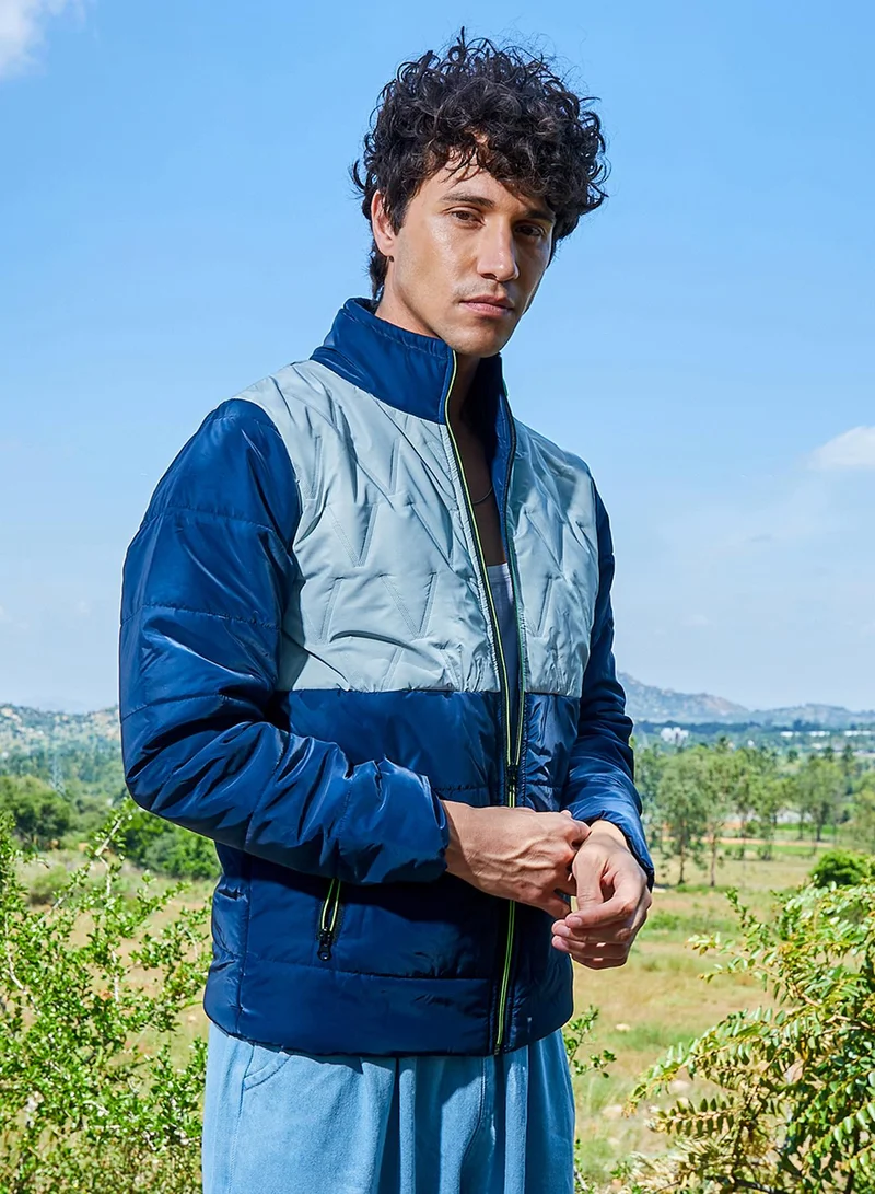 Campus Sutra Men's Navy Blue & Light Grey Contrast V Quilted Puffer Jacket For Casual Wear | High Neck | Long Sleeve | Zipper Closure | Jacket Crafted With Comfort Fit For Casual Wear