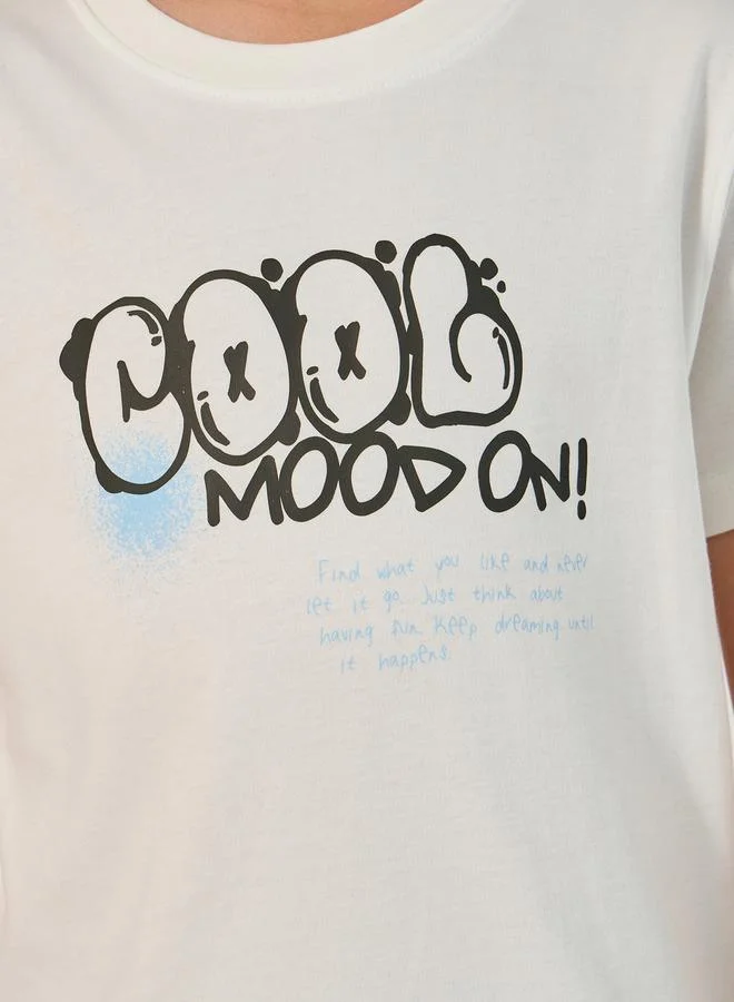 Styli Graphic Print Round Neck T-Shirt with Badge Detail