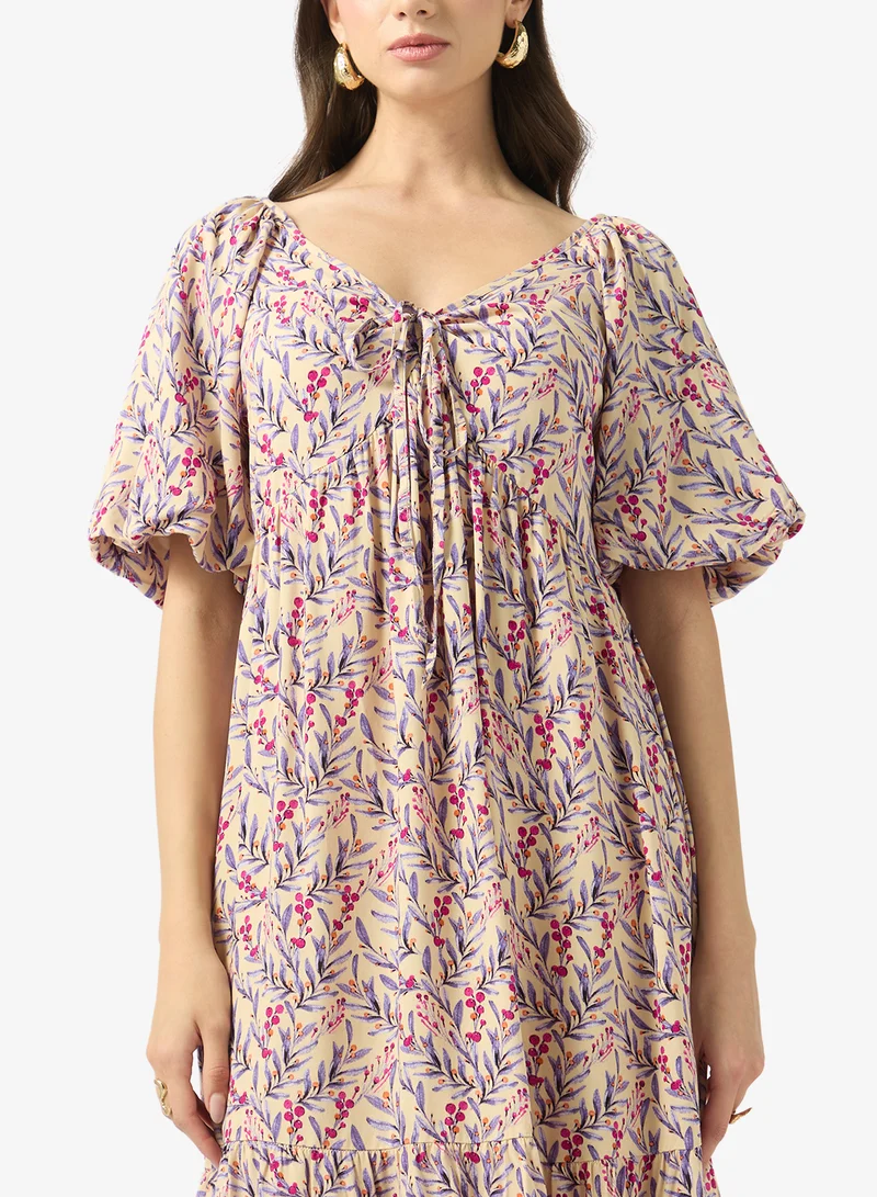 FYOR  Printed Tie-Up Neck Flowy Midi Dress for Women | Best Price UAE