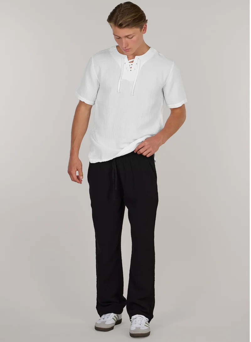 جاست نيتشر قميص  أنيق برقبة دائرية وخيط دي سي