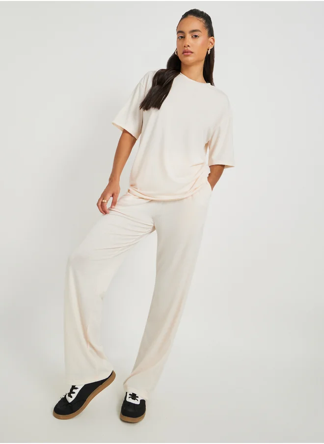 ستايلي Text Print Short Sleeve T-Shirt and Wide Leg Joggers Co-Ords