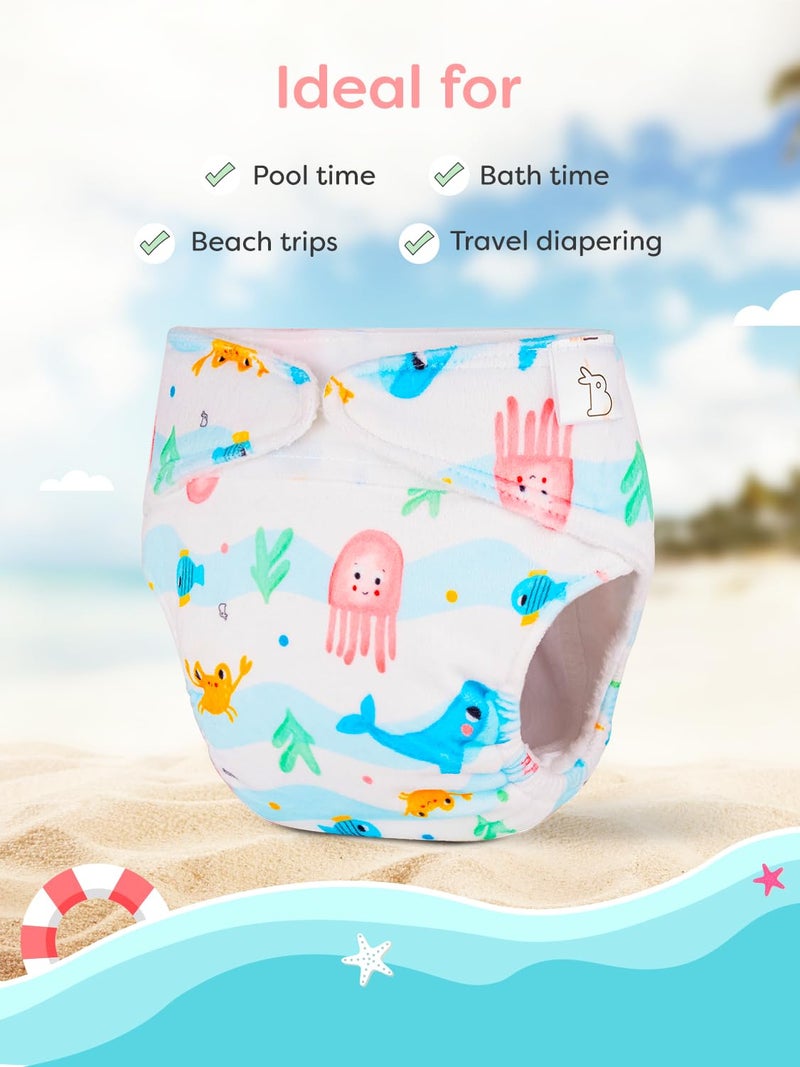 Superbottoms حفاضة سبربوتومز القابلة لإعادة الاستخدام للسباحة | غلاف حفاضة قماش سوبر سوفت مع فيلكرو | تناسب قابل للتعديل من 3 أشهر إلى 3 سنوات | لا حاجة لإدخال | حفاضة سباحة للأطفال خالية من الطفح الجلدي وصديقة للبيئة - Image 4