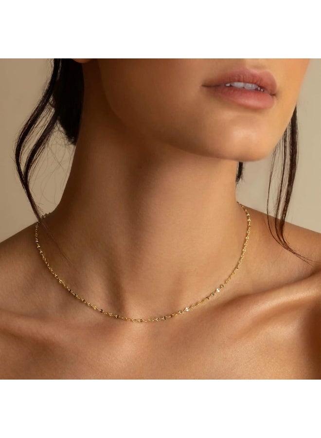 Luxuria A sleek, modern choker in 18k gold-plated stainless steel, featuring a simple twisted chain adorned with delicate faux beads and a thin clasp – perfect for everyday wear. - Image 1
