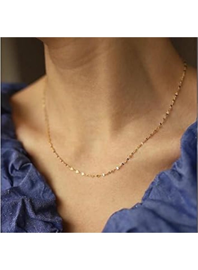 Luxuria A sleek, modern choker in 18k gold-plated stainless steel, featuring a simple twisted chain adorned with delicate faux beads and a thin clasp – perfect for everyday wear. - Image 3