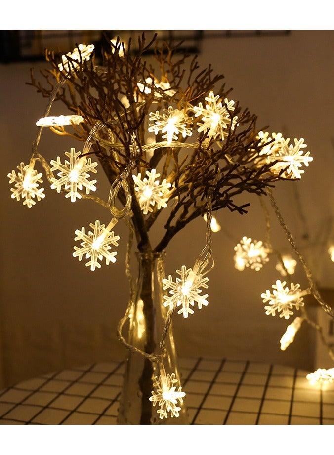 3M 20 LED ندفة الثلج Fairy String String - أبيض دافئ ، يعمل بالبطارية (2x AA) ، ثابت ، ديكور شتوي لعيد الميلاد لغرفة النوم ، الجدار ، النافذة ، الحفلة ، الأجواء الداخلية والخارجية - Image 1