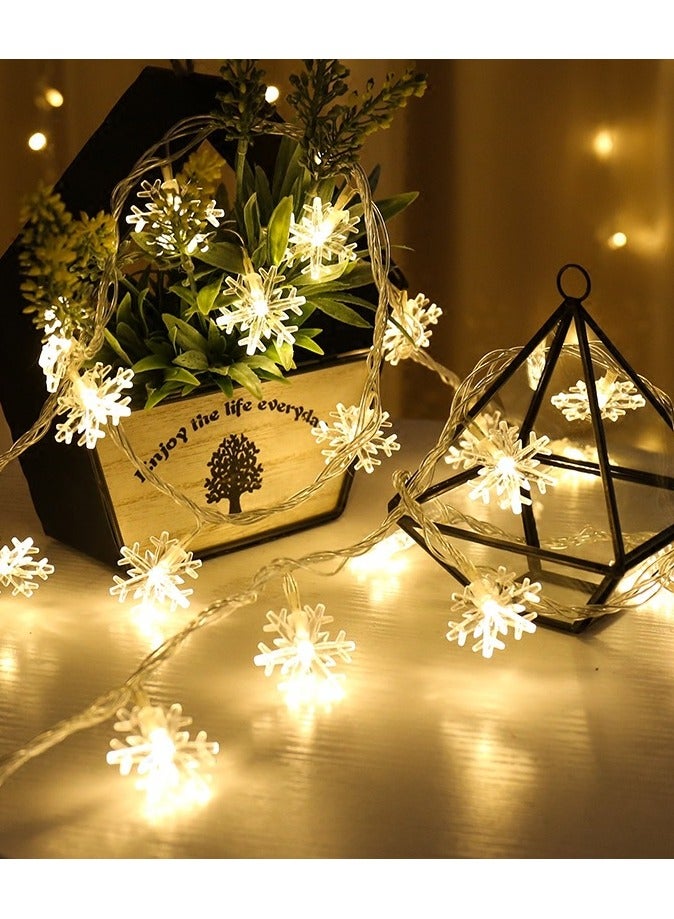 3M 20 LED ندفة الثلج Fairy String String - أبيض دافئ ، يعمل بالبطارية (2x AA) ، ثابت ، ديكور شتوي لعيد الميلاد لغرفة النوم ، الجدار ، النافذة ، الحفلة ، الأجواء الداخلية والخارجية - Image 4